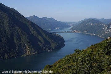 Tessin Wirtschaft - Lago di Lugano mit Damm von Melide